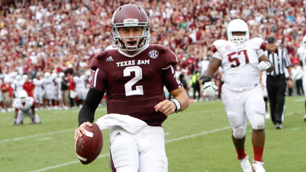 Sep 29, 2012; College Station, TX, USA; Texas A&M Aggies quarterback Johnny Manziel (2) runs the ball for a touchdown against the Arkansas Razorbacks in the fourth quarter at Kyle Field. Texas A&M defeated Arkansas 58-10.