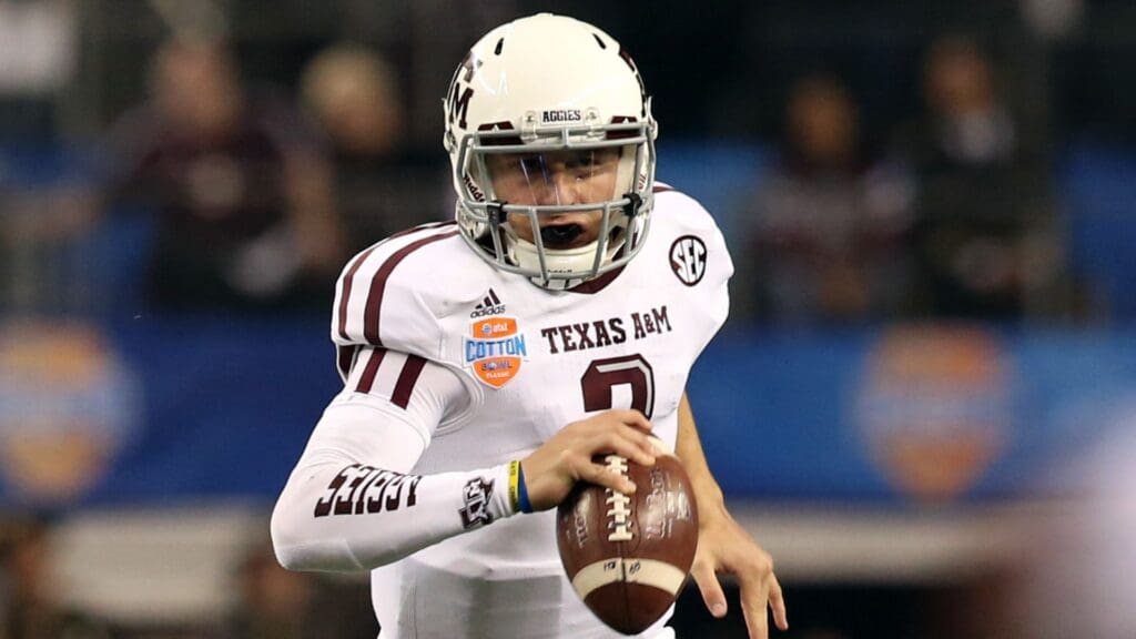 Jan 4, 2013; Arlington, TX, USA; Texas A&M Aggies quarterback Johnny Manziel (2) scrambles out of the pocket against the Oklahoma Sooners during the Cotton Bowl at Cowboys Stadium. Texas A&M beat Oklahoma 41-13.