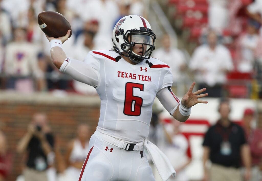 Aug 30, 2013; Dallas, TX, USA; Texas Tech Red Raiders quarterback Baker Mayfield (6) throws a pass in the first quarter of the game against the Southern Methodist Mustangs at Gerald J. Ford Stadium.