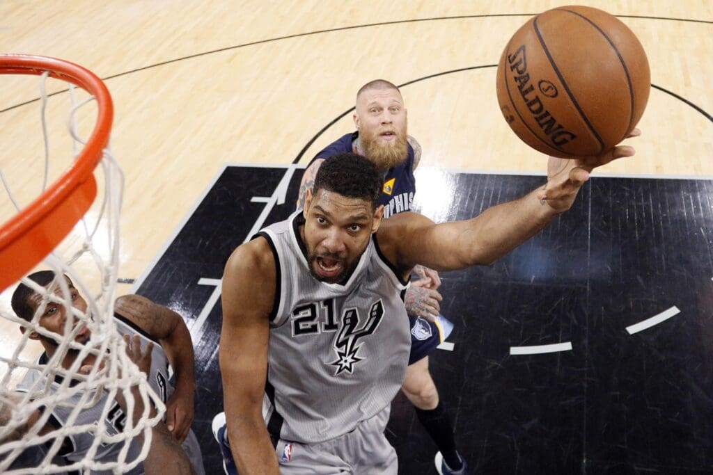 Apr 17, 2016; San Antonio, TX, USA; San Antonio Spurs power forward Tim Duncan (21) shoots the ball past Memphis Grizzlies power forward Chris Andersen (7, behind) during the second half in game one of the first round of the NBA Playoffs at AT&T Center