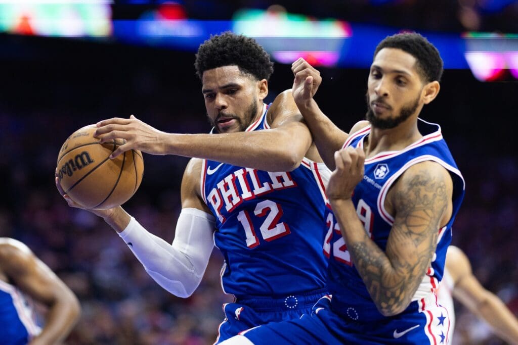 May 2, 2024; Philadelphia, Pennsylvania, USA; Philadelphia 76ers forward Tobias Harris (12) and guard Cameron Payne (22) play against the New York Knicks during the first half of game six of the first round for the 2024 NBA playoffs at Wells Fargo Center. Mandatory Credit: Bill Streicher-USA TODAY Sports