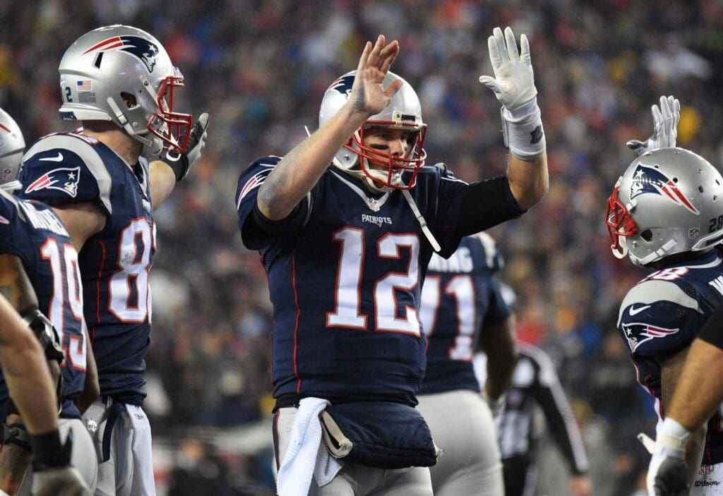 Jan 22, 2017; Foxborough, MA, USA; New England Patriots quarterback Tom Brady (12) celebrates after a touchdown during the third quarter against the Pittsburgh Steelers in the 2017 AFC Championship Game at Gillette Stadium.