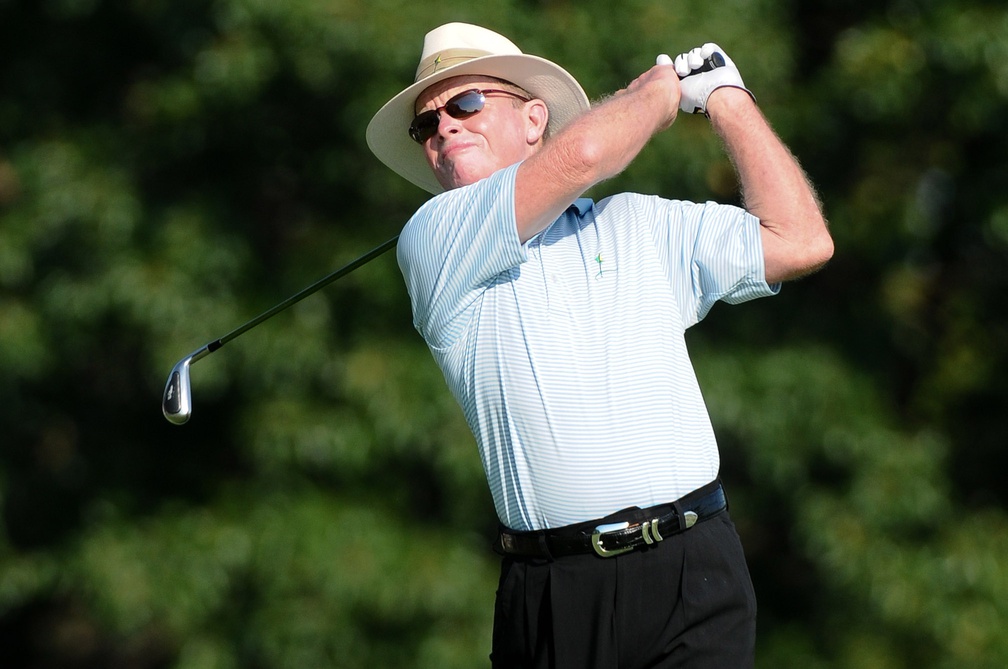 July 13, 2012; Lake Orion, MI, USA; Tom Kite (USA) tees off on the 9th hole during the second round of the U.S. Senior Open at Indianwood Golf and Country Club.