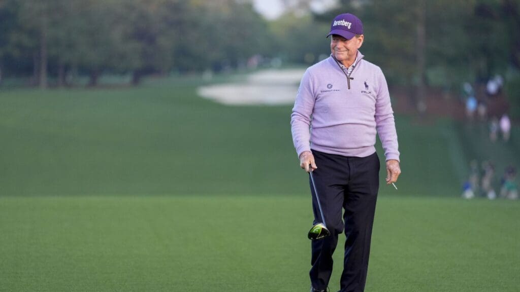 Apr 10, 2025; Augusta, Georgia, USA; Tom Watson walks off the no. 1 tee after serving as an honorary starter during the first round of the Masters Tournament.