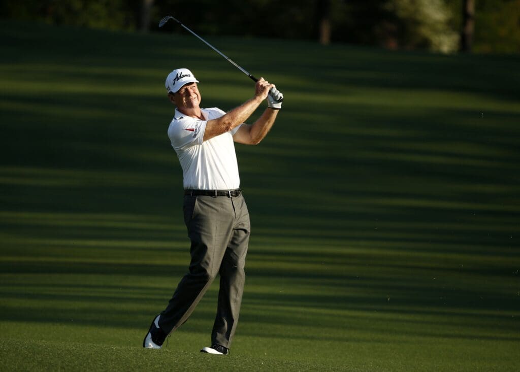 Apr 9, 2015; Augusta, GA, USA; Tom Watson hits his approach to the 2nd green during the first round of The Masters golf tournament at Augusta National Golf Club.
