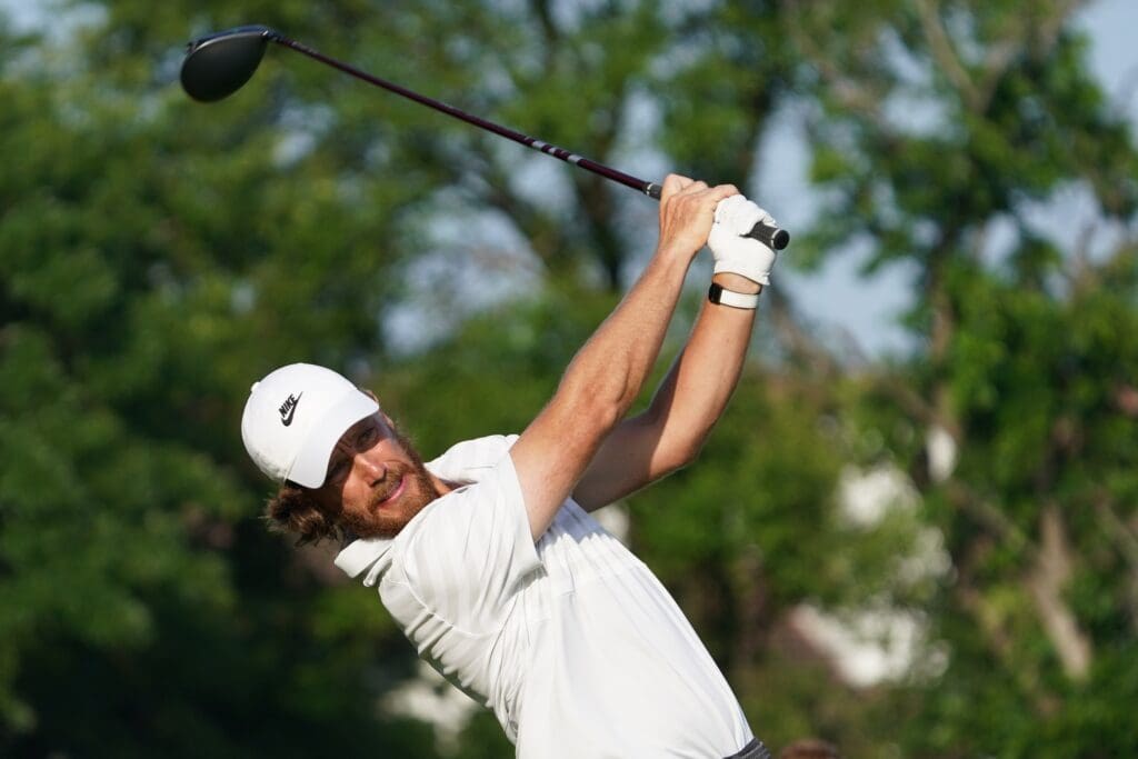 May 22, 2025; Fort Worth, Texas, USA; Tommy Fleetwood plays his shot from the 11th tee during the first round of the Charles Schwab Challenge golf tournament.