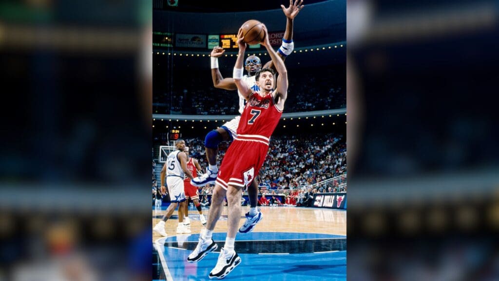 Apr 7, 1996; Orlando, FL; USA; FILE PHOTO; Chicago Bulls forward Toni Kukoc (7) attempts a shot against Orlando Magic forward Horace Grant (54) at the Orlando Arena.