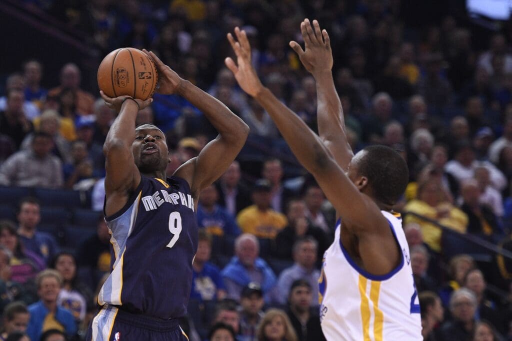 November 2, 2015; Oakland, CA, USA; Memphis Grizzlies guard Tony Allen (9) shoots the basketball against Golden State Warriors forward Harrison Barnes (40) during the first quarter at Oracle Arena.