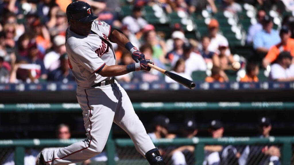Sep 27, 2015; Detroit, MI, USA; Minnesota Twins right fielder Torii Hunter (48) hits an RBI single during the second inning against the Detroit Tigers at Comerica Park. Mandatory Credit: Tim Fuller-Imagn Images