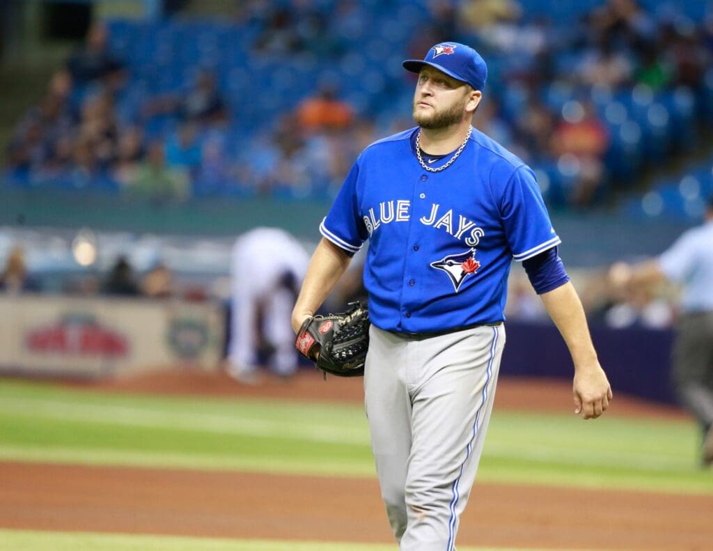 Oct 2, 2015; St. Petersburg, FL, USA; Toronto Blue Jays starting pitcher Mark Buehrle (56) walks back to the dugout against the Tampa Bay Rays at Tropicana Field.