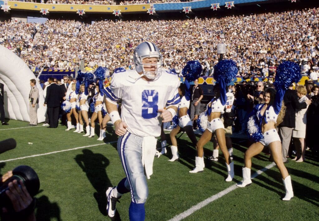 Jan 28, 1996; Tempe, AZ, USA; FILE PHOTO; Dallas Cowboys quarterback Troy Aikman (8) jogs on to the field at Sun Devil Stadium prior to Super Bowl XXX against the Pittsburgh Steelers. The Cowboys would defeat the Steelers 27-17. Mandatory Credit: James D. Smith-USA TODAY Sports