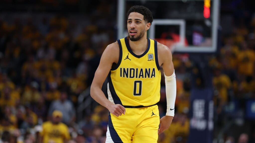 May 27, 2025; Indianapolis, Indiana, USA; Indiana Pacers guard Tyrese Haliburton (0) reacts after shooting a three point basket during the second quarter against the New York Knicks of game four of the eastern conference finals for the 2025 NBA Playoffs at Gainbridge Fieldhouse.