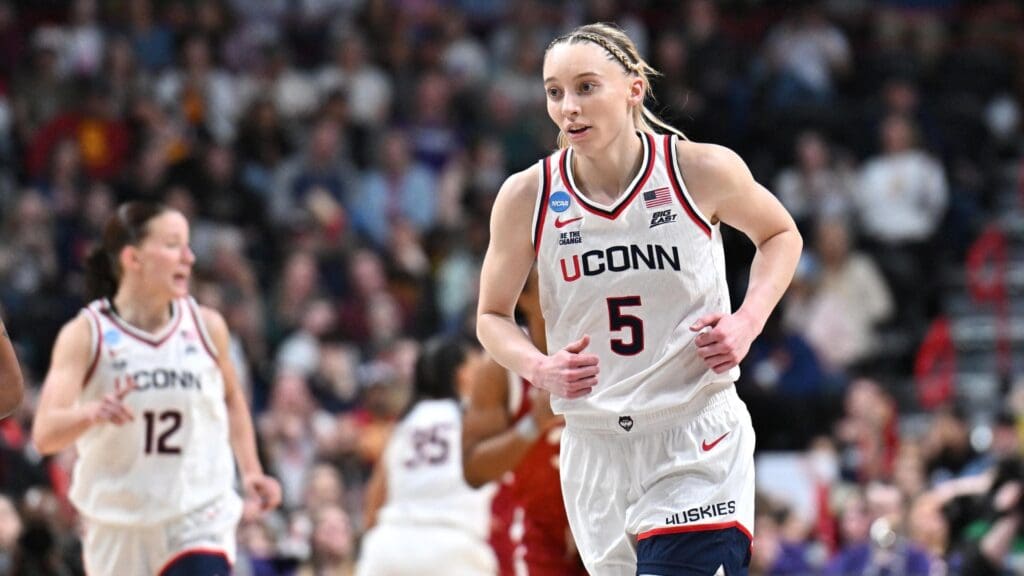 Mar 29, 2025; Spokane, WA, USA; UConn Huskies guard Paige Bueckers (5) runs back on defense against the Oklahoma Sooners during the second half of a Sweet 16 NCAA Tournament basketball game at Spokane Arena