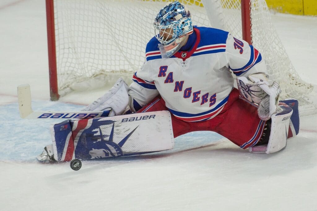 Dec 13, 2017; Ottawa, Ontario, CAN; New York Rangers goalie Henrik Lundqvist (30) makes a save in the third period against the Ottawa Senators at Canadian Tire Centre
