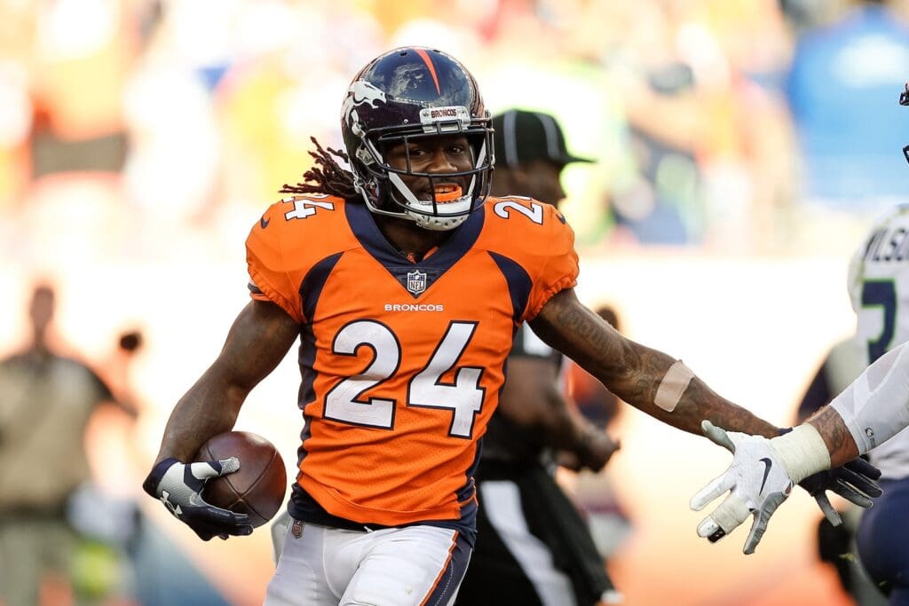 Sep 9, 2018; Denver, CO, USA; Denver Broncos cornerback Adam Jones (24) celebrates after a game winning interception in the fourth quarter against the Seattle Seahawks at Broncos Stadium at Mile High