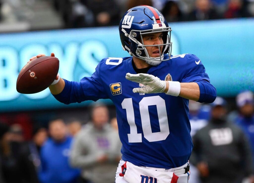 Dec 30, 2018; East Rutherford, NJ, USA; New York Giants quarterback Eli Manning (10) throws a pass in the first quarter against the Dallas Cowboys at MetLife Stadium.