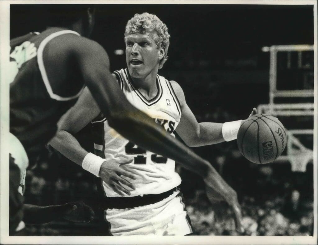 Jack Sikma looked for an opening at the Bradley Center in 1988. 1988 Press Photo Bucks Basketball Player Jack Sikma With The Ball During Game