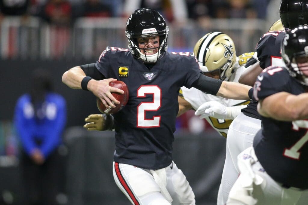 Nov 28, 2019; Atlanta, GA, USA; Atlanta Falcons quarterback Matt Ryan (2) is sacked by New Orleans Saints defensive end Marcus Davenport (92) in the first half at Mercedes-Benz Stadium