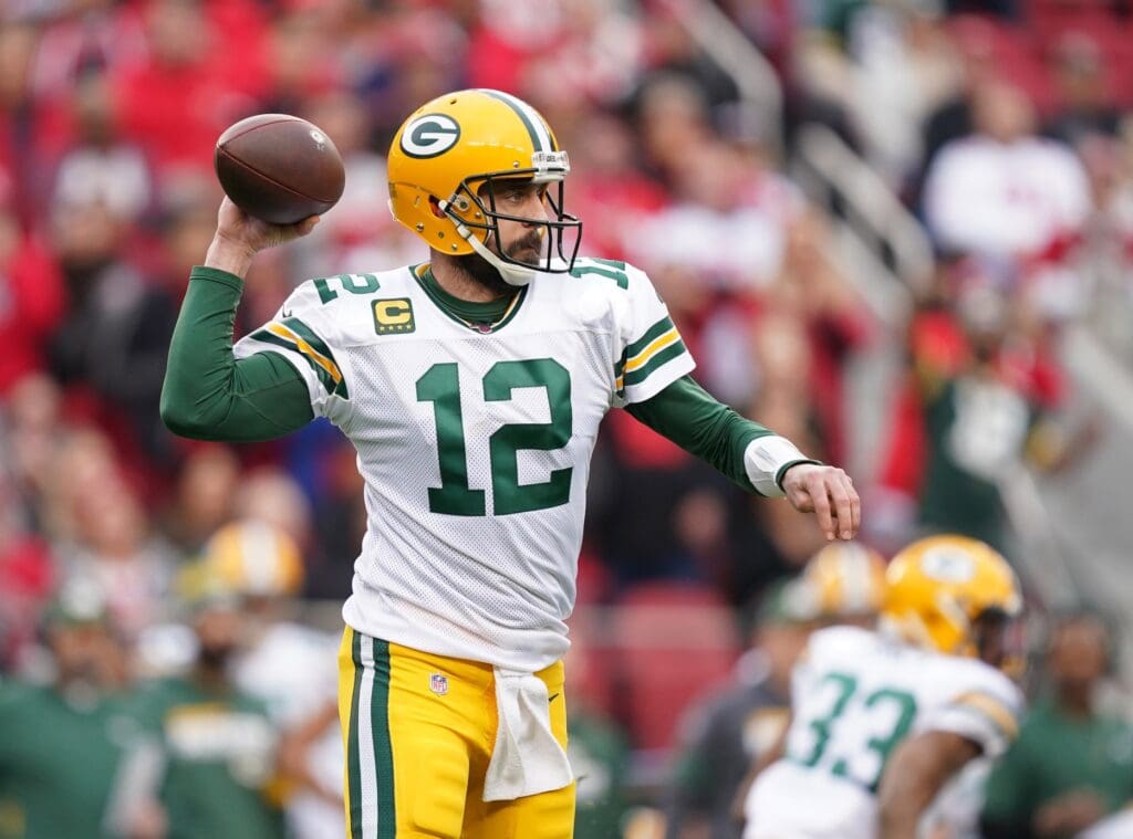 Jan 19, 2020; Santa Clara, California, USA; Green Bay Packers quarterback Aaron Rodgers (12) throws a pass against the San Francisco 49ers in the first half of the NFC Championship Game at Levi's Stadium. 