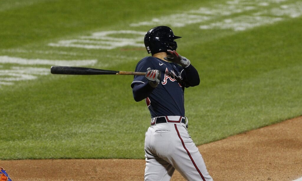 Sep 18, 2020; New York City, New York, USA; Atlanta Braves right fielder Nick Markakis (22) hits a two run double against the New York Mets during the fourth inning at Citi Field.