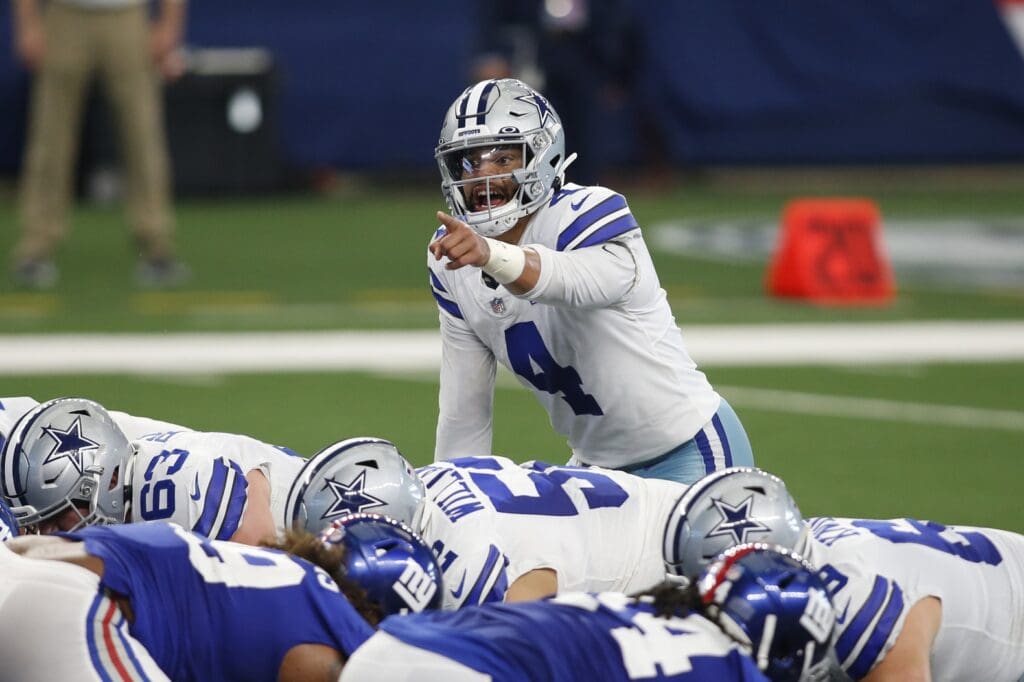 Oct 11, 2020; Arlington, Texas, USA; Dallas Cowboys quarterback Dak Prescott (4) calls a play in the second quarter against the New York Giants at AT&T Stadium
