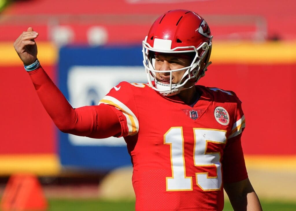 Nov 1, 2020; Kansas City, Missouri, USA; Kansas City Chiefs quarterback Patrick Mahomes (15) signals to a teammate during the first half against the New York Jets at Arrowhead Stadium.