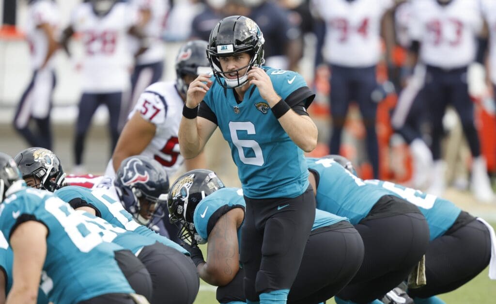 Nov 8, 2020; Jacksonville, Florida, USA; Jacksonville Jaguars quarterback Jake Luton (6) changes the play at the line against the Houston Texans during the first quarter at TIAA Bank Field.