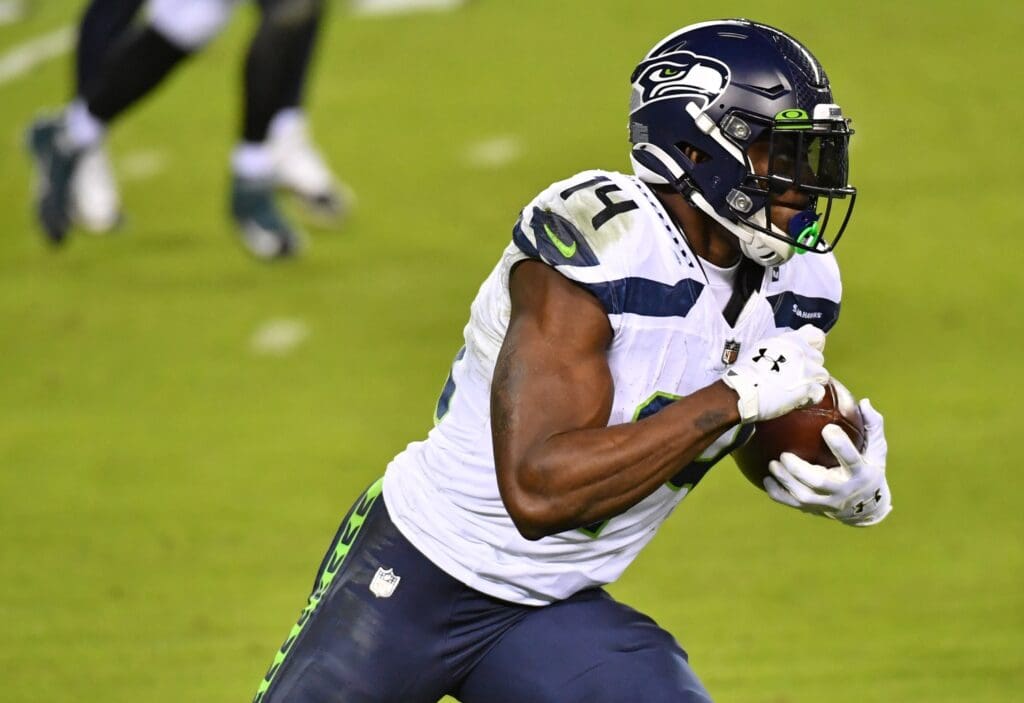Nov 30, 2020; Philadelphia, Pennsylvania, USA; Seattle Seahawks wide receiver DK Metcalf (14) gains yards after catch during the first quarter against the Philadelphia Eagles at Lincoln Financial Field.