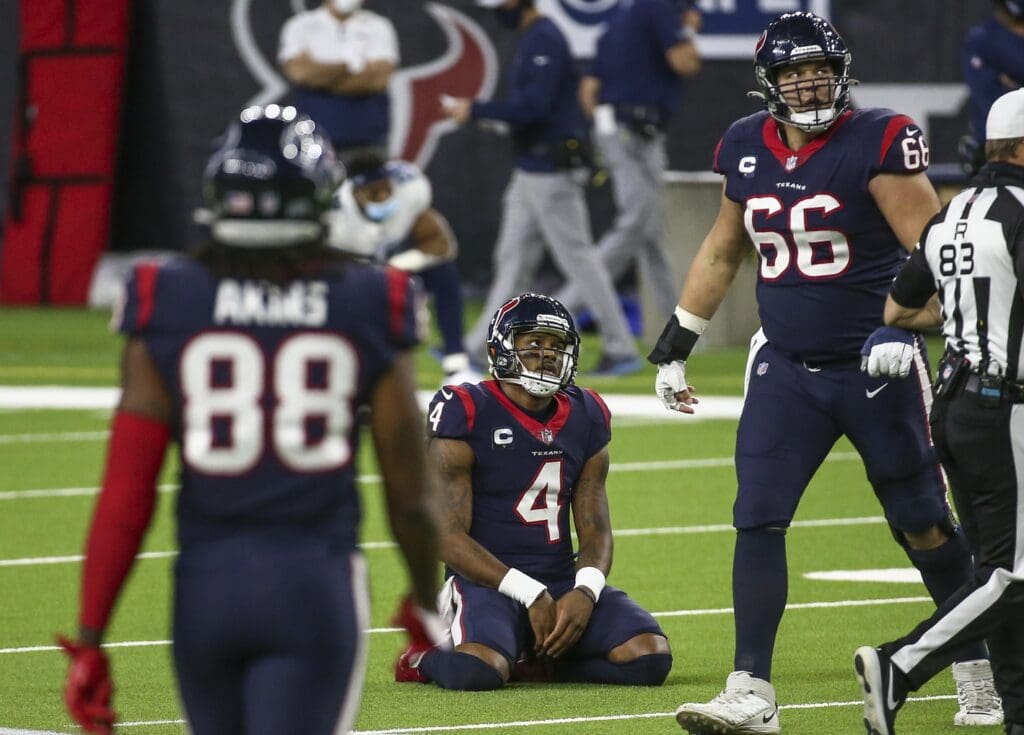 an 3, 2021; Houston, Texas, USA; Houston Texans quarterback Deshaun Watson (4) looks up after a play during the fourth quarter against the Tennessee Titans at NRG Stadium