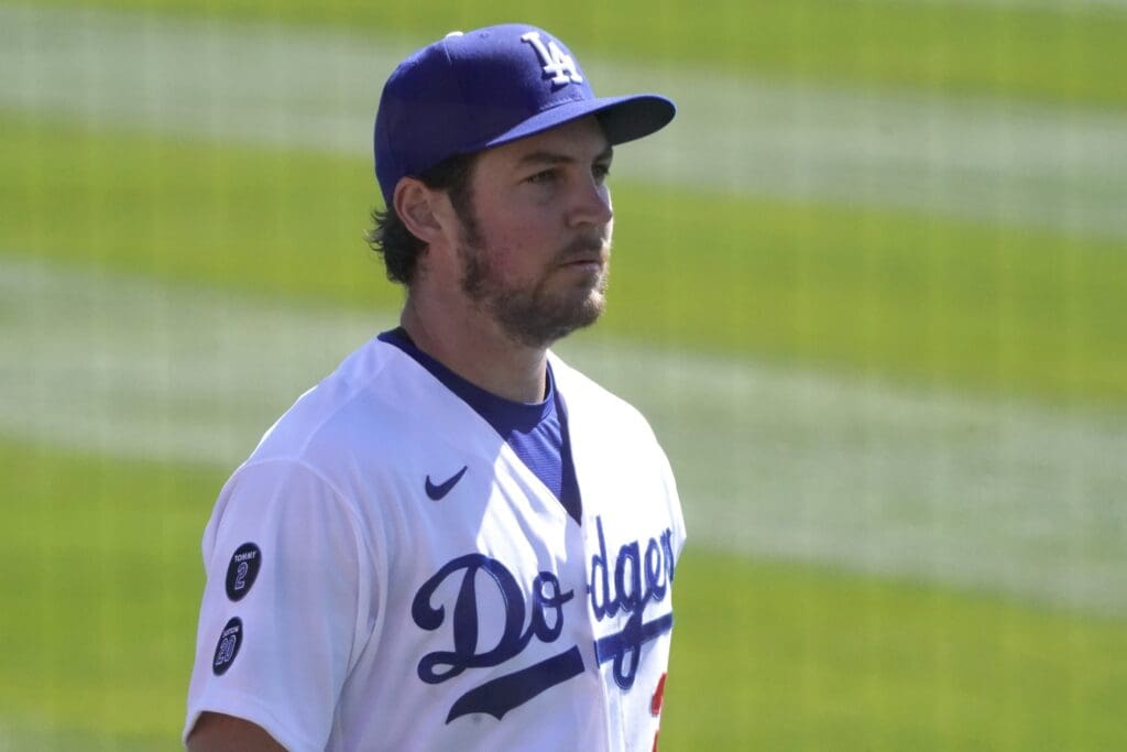 Mar 1, 2021; Glendale, Arizona, USA; Los Angeles Dodgers starting pitcher Trevor Bauer (27) gets ready for a spring training game against the Colorado Rockies at Camelback Ranch. Mandatory Credit: Rick Scuteri-USA TODAY Sports