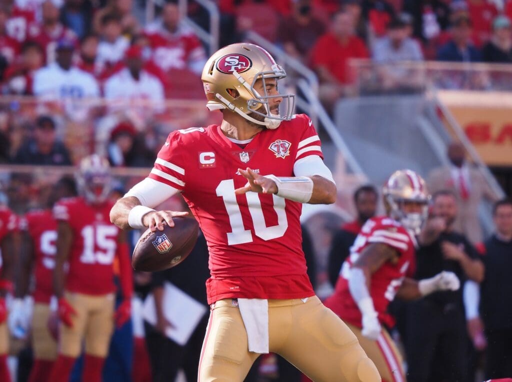 Nov 28, 2021; Santa Clara, California, USA; San Francisco 49ers quarterback Jimmy Garoppolo (10) throws the ball against the Minnesota Vikings during the first quarter at Levi's Stadium