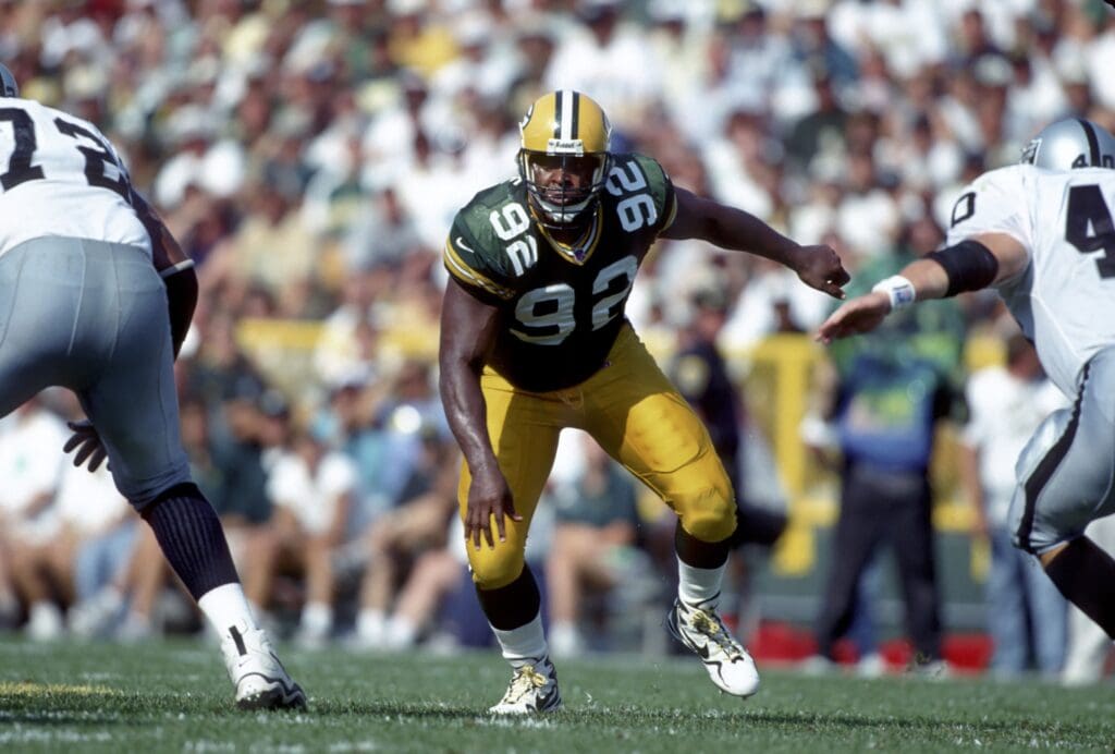 Aug 16, 1998; Green Bay, WI, USA; FILE PHOTO; Reggie White of the #92 Green Bay Packers in pre-season action aganist the Oakland Raiders.