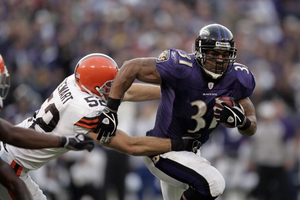 Dec 17, 2006; Baltimore, MD, USA; Baltimore Ravens running back (31) Jamal Lewis carries the ball as Cleveland Browns linebacker (52) Matt Stewart tackles him in the third quarter at M&T Bank Stadium in Baltimore, MD.