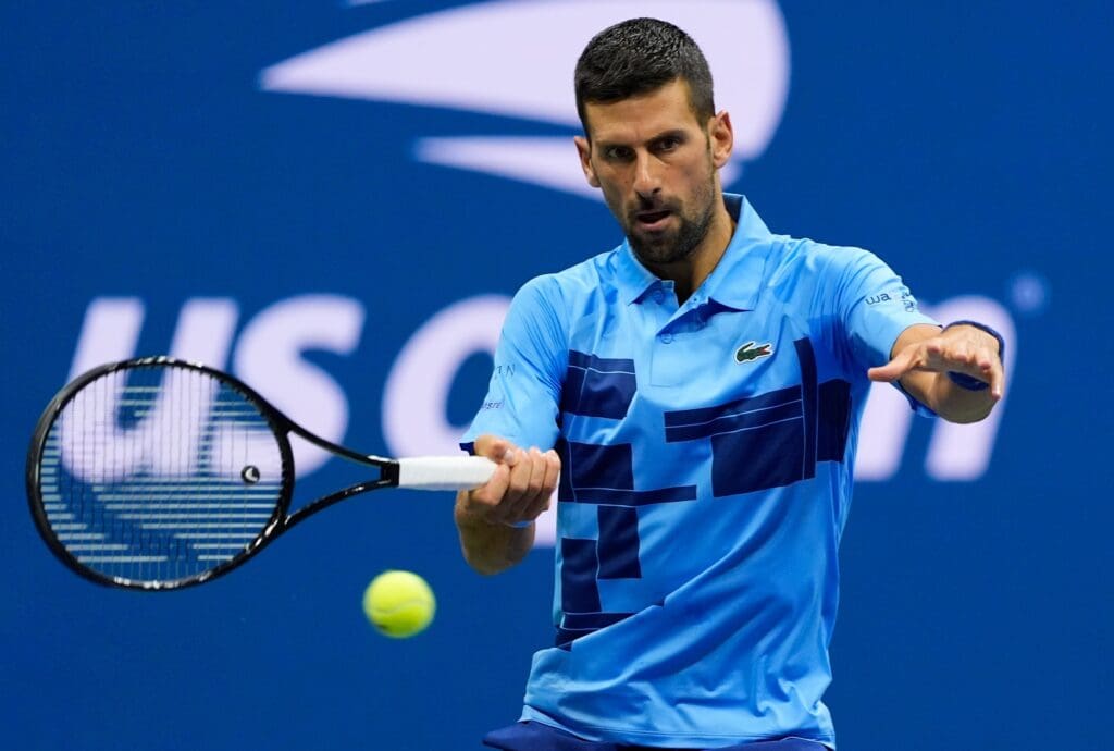 Aug 30, 2024; Flushing, NY, USA; Novak Djokovic (SRB) hits to Alexei Popyrin (AUS) on day five of the 2024 U.S. Open tennis tournament at USTA Billie Jean King National Tennis Center
