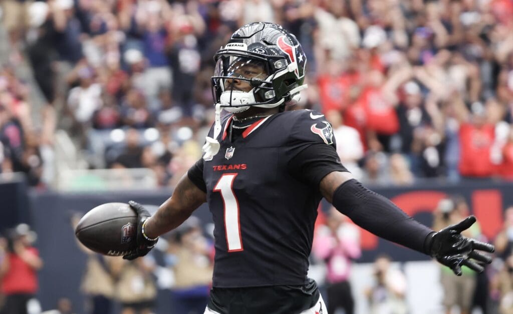 Sep 29, 2024; Houston, Texas, USA; Houston Texans wide receiver Stefon Diggs (1) scores against the Jacksonville Jaguars in the first quarter at NRG Stadium