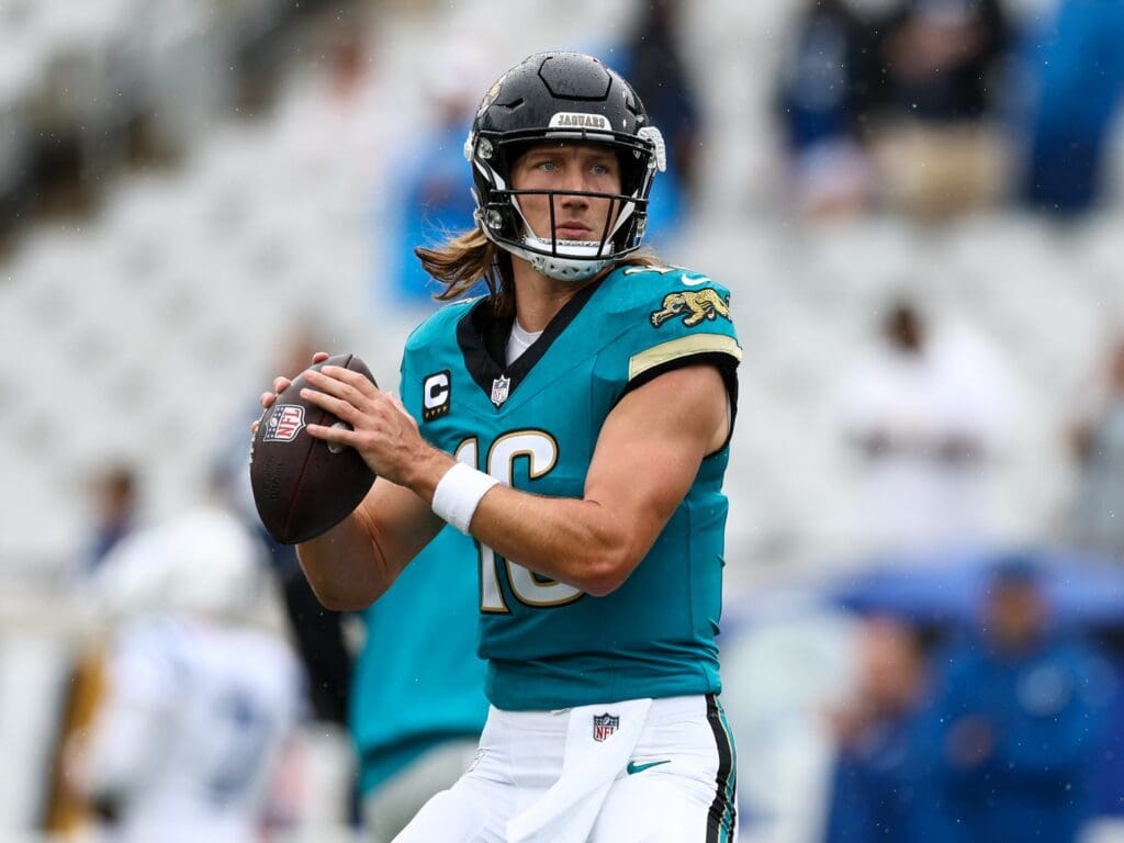 Oct 6, 2024; Jacksonville, Florida, USA; Jacksonville Jaguars quarterback Trevor Lawrence (16) warms up before a game against the Indianapolis Colts at EverBank Stadium.