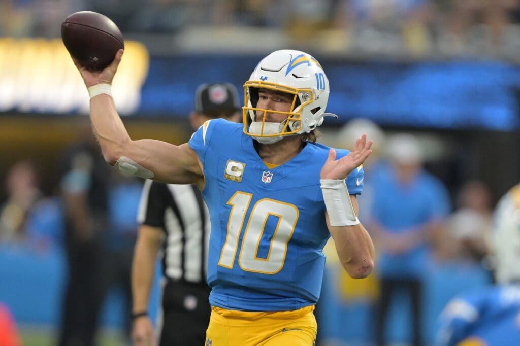 Nov 10, 2024; Inglewood, California, USA; Los Angeles Chargers quarterback Justin Herbert (10) throws a pass in the second half against the Tennessee Titans at SoFi Stadium.