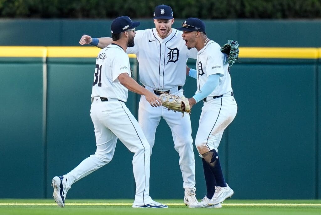 From left, Detroit Tigers left fielder Riley Greene (31), center fielder Parker Meadows (22) and right fielder Wenceel Pérez (46) celebrate 3-0 win over Cleveland Guardians at Game 3 of ALDS at Comerica Park in Detroit on Wednesday, Oct. 9, 2024.