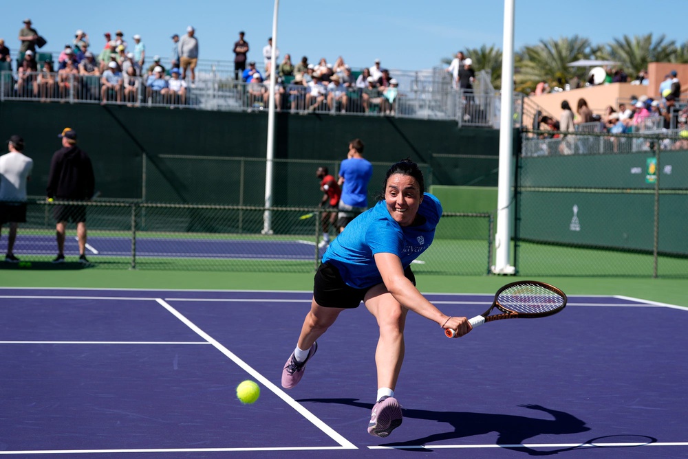 Ons Jabeur chases down a return during a practice session at the BNP Paribas Open at the Indian Wells Tennis Garden in Indian Wells, Calif., on Tuesday, March 4, 2025.
