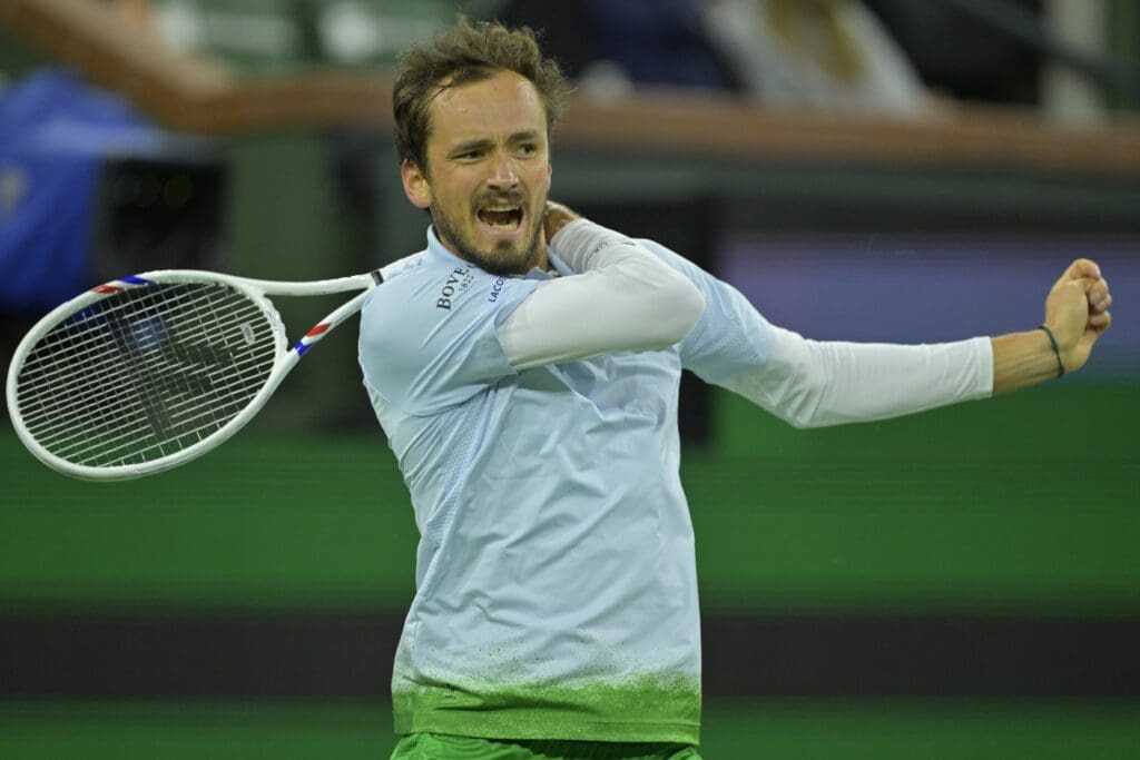 Mar 7, 2025; Indian Wells, CA, USA; Daniil Medvedev (RUS) hits a shot as he defeated Yunchaokete Bu (not pictured) in his second round match during the BNP Paribas Open at the Indian Well Tennis Garden. Mandatory Credit: Jayne Kamin-Oncea-Imagn Images