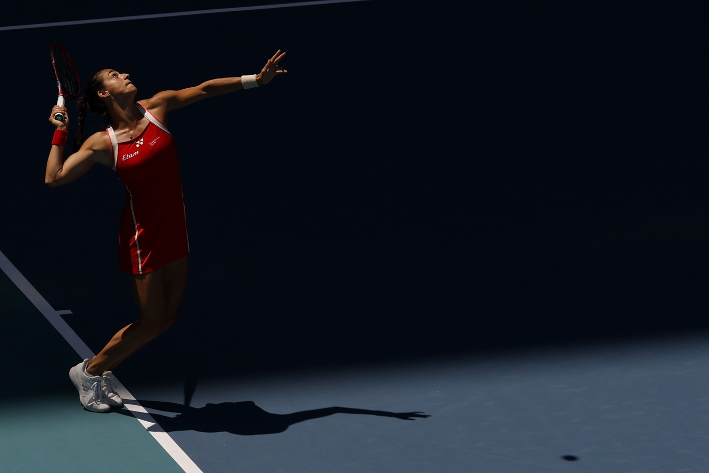 Mar 21, 2025; Miami, FL, USA; Caroline Garcia (FRA) serves against Iga Swiatek (POL) on day four of the Miami Open at Hard Rock Stadium. Mandatory Credit: Geoff Burke-Imagn Images