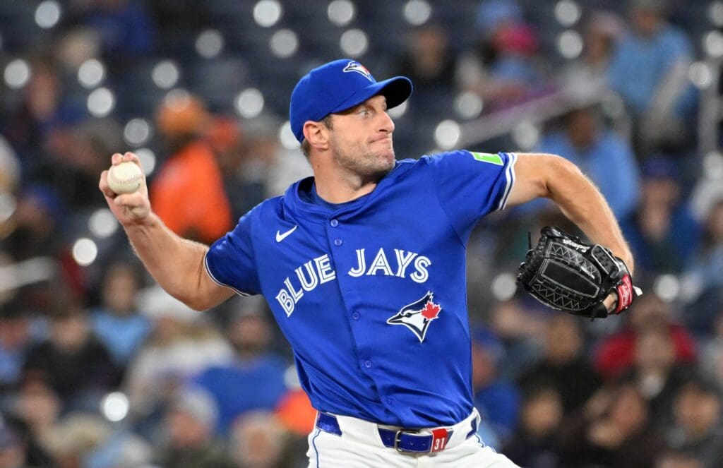 Mar 29, 2025; Toronto, Ontario, CAN; Toronto Blue Jays starting pitcher Max Scherzer (31) delivers a pitch against the Baltimore Orioles in the first inning at Rogers Centre.