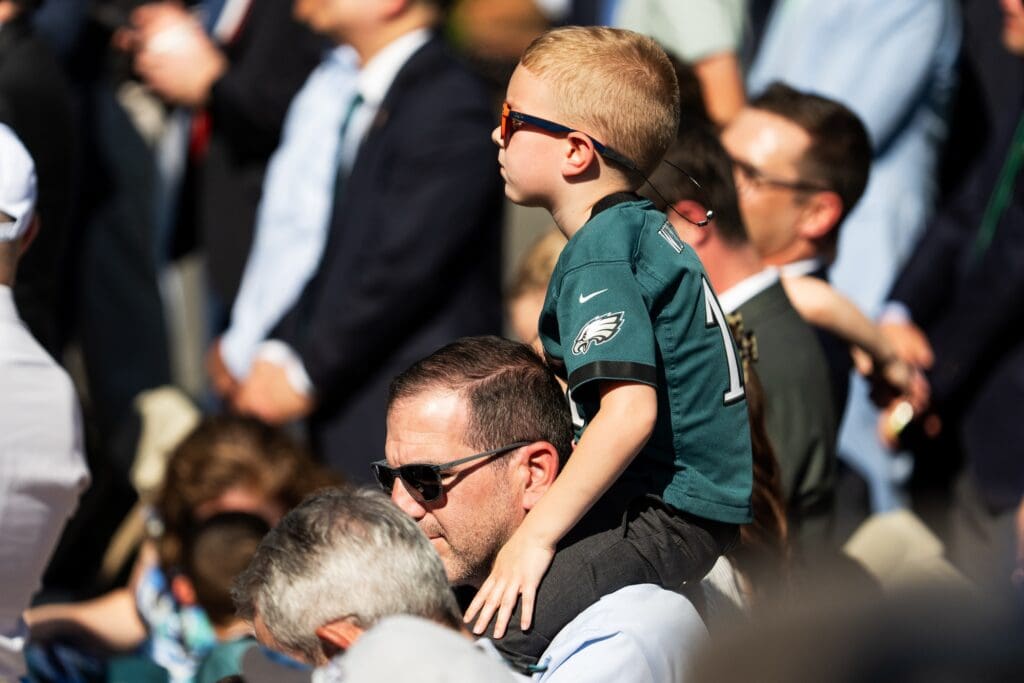 Apr 28, 2025; Washington, D.C., USA; A young Philadelphia Eagles fan watches as his team celebrates their Super Bowl victory at the White House Monday, April 28, 2025.