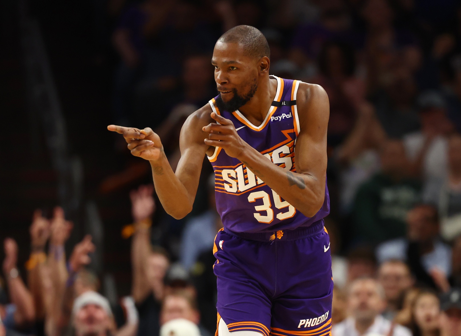 Mar 24, 2025; Phoenix, Arizona, USA; Phoenix Suns forward Kevin Durant (35) reacts against the Milwaukee Bucks at Footprint Center. Mandatory Credit: Mark J. Rebilas-Imagn Images