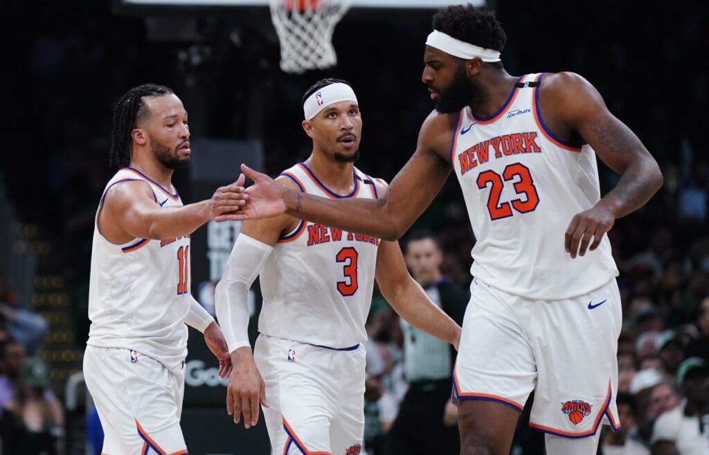 May 7, 2025; Boston, Massachusetts, USA; New York Knicks guard Jalen Brunson (11) and center Mitchell Robinson (23) react after a play against the Boston Celtics in the second half during game two of the second round for the 2025 NBA Playoffs at TD Garden