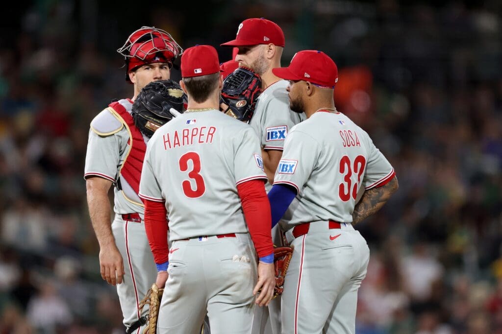 May 23, 2025; West Sacramento, California, USA; Philadelphia Phillies starting pitcher Zack Wheeler (45) meets with the infielders in the seventh inning against the Athletics at Sutter Health Park