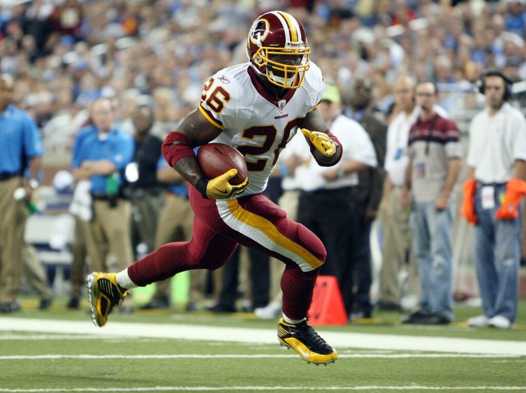 Sep 27, 2009; Detroit, MI, USA; Washington Redskins running back Clinton Portis (26) runs for a short gain in the second quarter at Ford Field