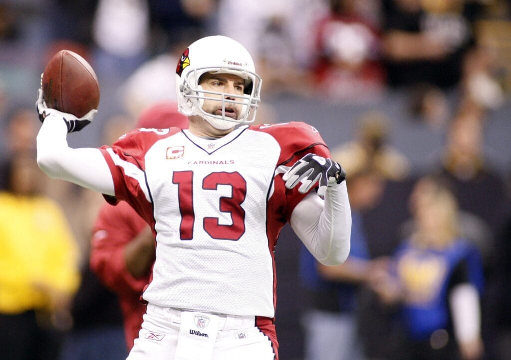 Jan. 16, 2010; New Orleans, LA, USA; Arizona Cardinals quarterback Kurt Warner (13) passing during pregame before their game against the New Orleans Saints at the Louisiana Superdome.