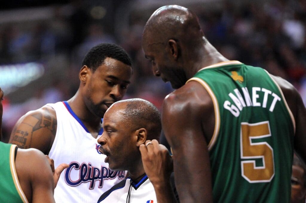 March 12, 2012; Los Angeles, CA, USA; Los Angeles Clippers center DeAndre Jordan (6) and Boston Celtics power forward Kevin Garnett (5) are given double technical fouls during the first half of the game at the Staples Center.