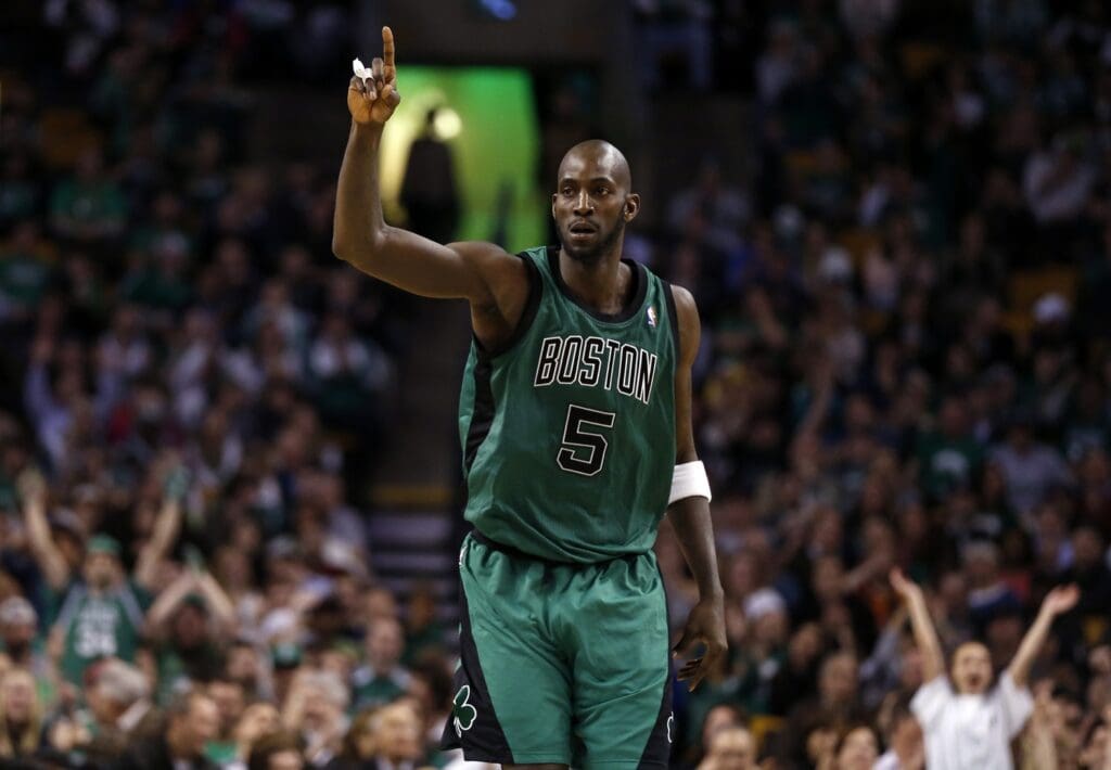 Mar 13, 2013; Boston, MA, USA; Boston Celtics center Kevin Garnett (5) returns down court against the Toronto Raptors during the second half at the TD Garden. The Celtics defeated the Toronto Raptors 112-88.